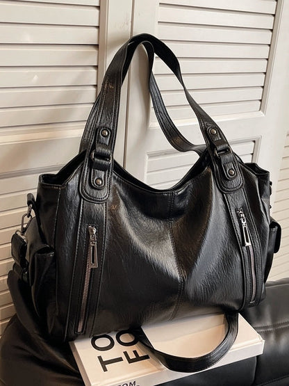 Borsa tote alla moda con rivetti di alta gamma e grande capacità