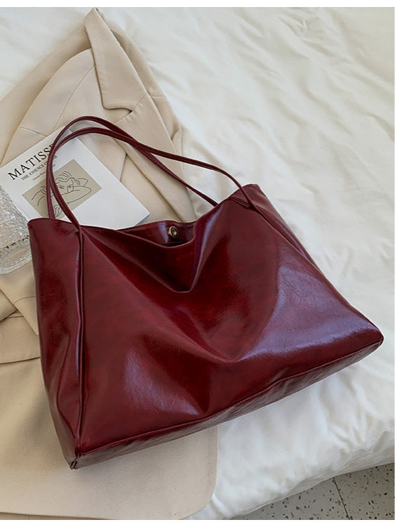 Borsa a secchiello in pelle morbida di grande capacità