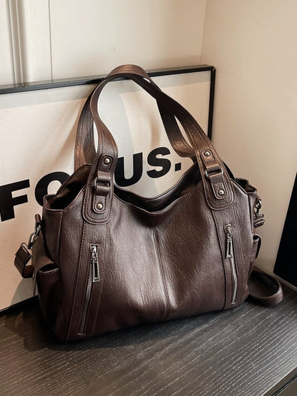 Borsa tote alla moda con rivetti di alta gamma e grande capacità