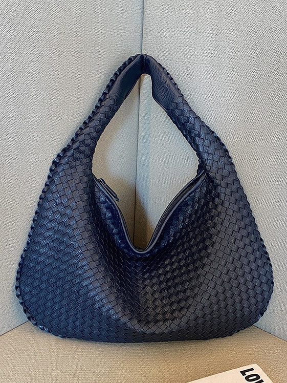 Borsa in pelle intrecciata alla moda