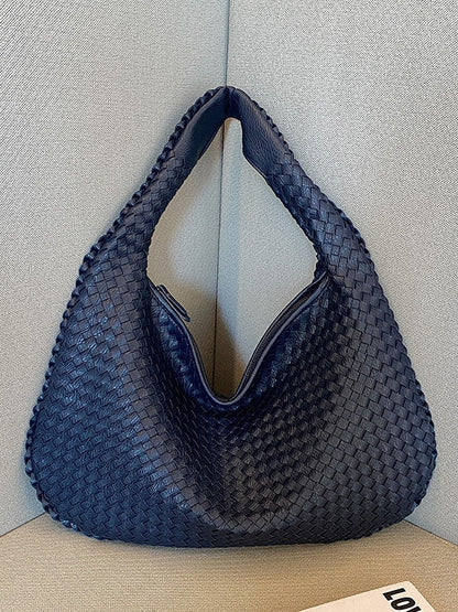 Borsa in pelle intrecciata alla moda