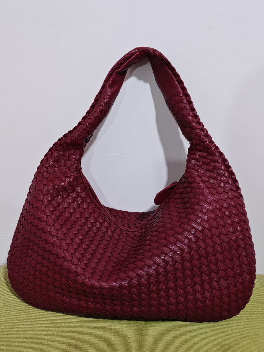 Borsa in pelle intrecciata alla moda