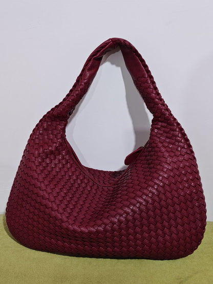 Borsa in pelle intrecciata alla moda