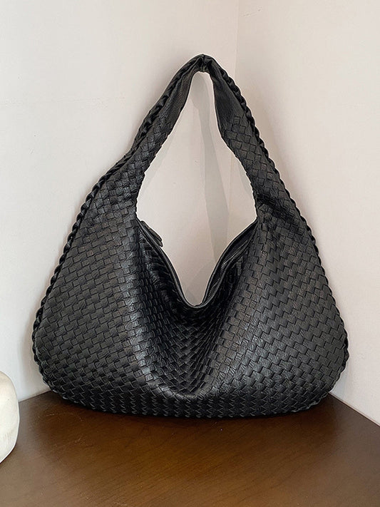 Borsa in pelle intrecciata alla moda