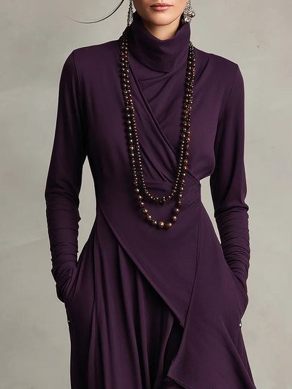 Mariangela | Vestito Maxi Plissettato Asimmetrico Viola con Collo Alto (Collana non inclusa)